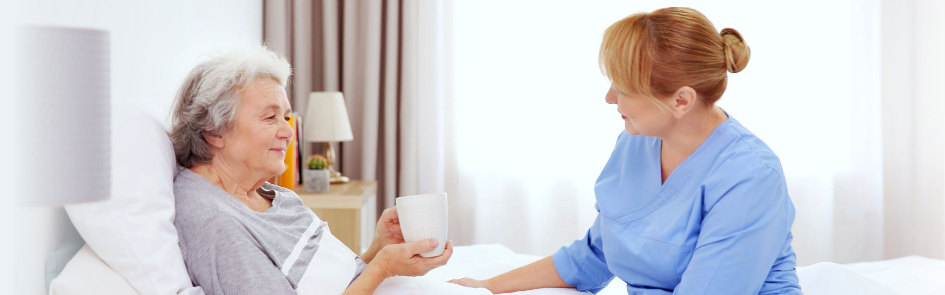 patient woman with caretaker